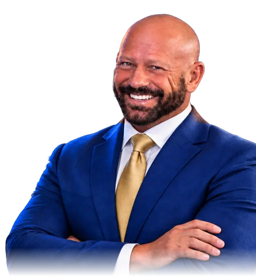 Chad Moore, founder and CEO of Xonicwave, smiling in a blue suit with arms crossed
